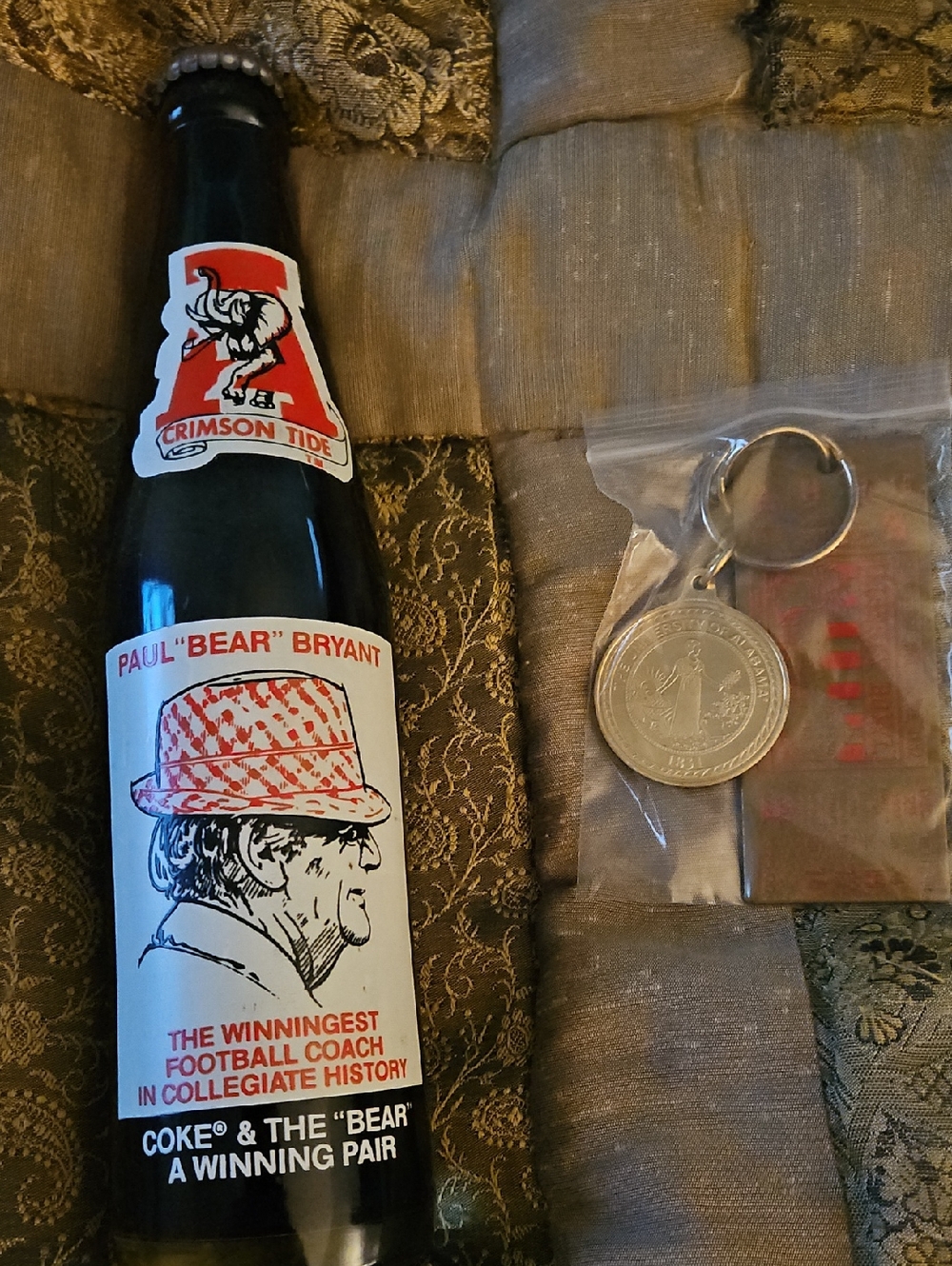 Lot Of 2-Alabama Keychain.1982 Liberty Bowl Brass Keychain + Alabama Coke Bottle